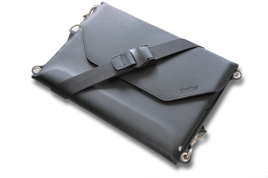 Carrying case with shoulder strap for iPad Pro 9.7". Turns into a mobile desk. 