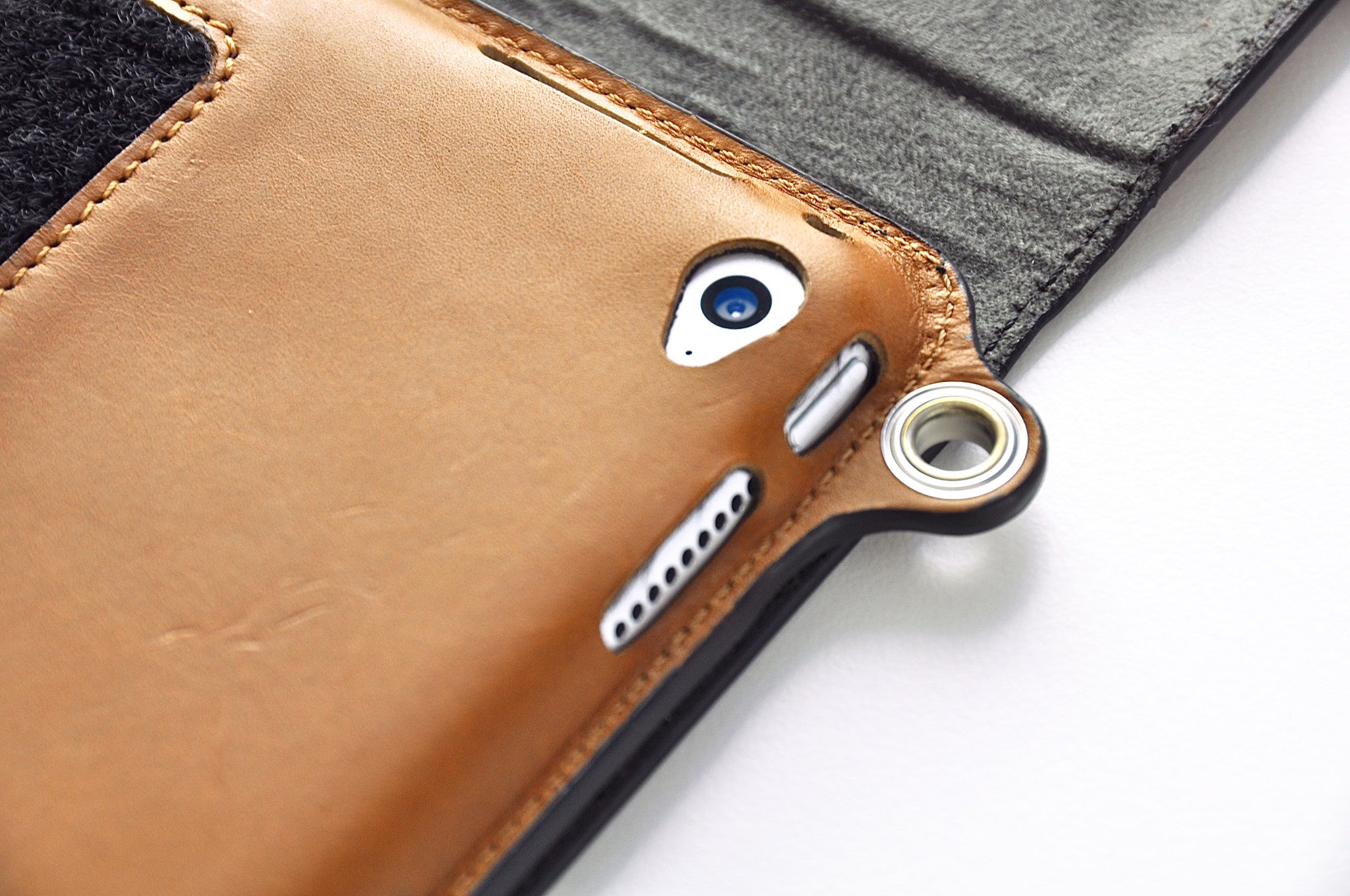 Camera lens is exposed for taking pictures when iPad case is in hands-free mode. 
